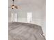 Main bedroom with carpet and access to bathroom at 845 Nevis Way, Mcdonough, GA 30253
