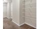 Spacious walk-in closet with wire shelving at 845 Nevis Way, Mcdonough, GA 30253