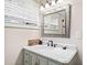 Bathroom with a vanity, marble countertop, and mirror at 103 Cardinal Se Rd, White, GA 30184
