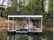 Lakefront property with large two story dock and lift at 103 Cardinal Se Rd, White, GA 30184