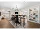 Bright dining area with a rustic table and built-in shelving at 103 Cardinal Se Rd, White, GA 30184