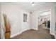 Inviting entryway with tile flooring and view into dining area at 103 Cardinal Se Rd, White, GA 30184
