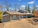 Gray house with attached garage and large yard at 103 Cardinal Se Rd, White, GA 30184
