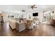 Spacious living room with hardwood floors and multiple seating areas at 103 Cardinal Se Rd, White, GA 30184