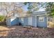 Rear view of house showing detached structure and yard at 1095 Mcdaniel Sw St, Atlanta, GA 30310