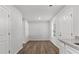 Bright dining room with hardwood floors and neutral walls at 7236 Crestside Dr, Austell, GA 30168