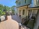 Spacious composite deck with stairs, offering views of the backyard and neighboring homes at 5981 Brundage Ln, Norcross, GA 30071