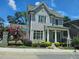 Gray two-story house with white trim and landscaping at 5981 Brundage Ln, Norcross, GA 30071