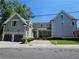 Two-story home with two-car garage, landscaping, and brick accents at 5981 Brundage Ln, Norcross, GA 30071