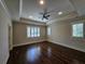 Spacious main bedroom with hardwood floors and plantation shutters at 5981 Brundage Ln, Norcross, GA 30071
