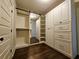 Large walk-in closet with ample shelving and drawer space at 5981 Brundage Ln, Norcross, GA 30071