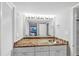 Updated bathroom with granite vanity, copper sink, and walk-in shower at 141 Maison Nw Pl, Atlanta, GA 30327
