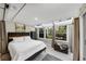 Bedroom with skylights, window access to backyard and neutral decor at 141 Maison Nw Pl, Atlanta, GA 30327