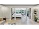Bright bedroom with access to sunroom and a view to the backyard at 141 Maison Nw Pl, Atlanta, GA 30327