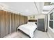 Spacious bedroom with large windows, skylights, and built in dresser at 141 Maison Nw Pl, Atlanta, GA 30327