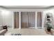 Open living space with sunroom access and neutral color scheme at 141 Maison Nw Pl, Atlanta, GA 30327