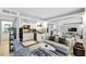 Open living room with adjacent kitchen and seating area at 141 Maison Nw Pl, Atlanta, GA 30327