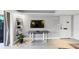 Living room with built-in shelving and a drop-leaf table at 141 Maison Nw Pl, Atlanta, GA 30327