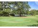 Community putting green next to tennis courts at 141 Maison Nw Pl, Atlanta, GA 30327