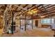 Unfinished basement with exposed ductwork, concrete floors, and natural light at 4847 Lakewood Dr, Acworth, GA 30101