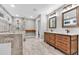 Modern bathroom with double vanity, granite countertop, walk-in shower, and soaking tub at 4847 Lakewood Dr, Acworth, GA 30101