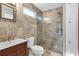 Well-lit bathroom with modern fixtures, a glass-enclosed shower, and stylish vanity at 4847 Lakewood Dr, Acworth, GA 30101