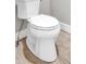 A sleek and clean white toilet in a modern bathroom setting at 4847 Lakewood Dr, Acworth, GA 30101