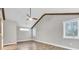 Bedroom with hardwood floors, modern ceiling fan, natural lighting, and beamed ceiling at 4847 Lakewood Dr, Acworth, GA 30101
