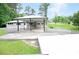 Charming one-story home with attached carport and beautiful surrounding trees at 4847 Lakewood Dr, Acworth, GA 30101