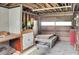 Garage space with work bench and roll-up doors at 4847 Lakewood Dr, Acworth, GA 30101