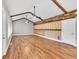 Bright living room with high ceilings, wooden beams, and hardwood floors at 4847 Lakewood Dr, Acworth, GA 30101
