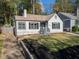 Charming white house with black shutters and a well-maintained lawn at 1046 Ormewood, Atlanta, GA 30316