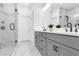 Modern bathroom with double vanity, gray cabinets, and a large walk-in shower at 6816 Prelude Dr, Sandy Springs, GA 30328