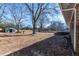 Spacious backyard, shed, and steps leading to patio at 850 Briarwood Trl, Douglasville, GA 30134