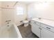 Updated bathroom with new vanity and tile flooring at 850 Briarwood Trl, Douglasville, GA 30134