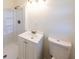 Clean bathroom with a white vanity, shower, and toilet at 850 Briarwood Trl, Douglasville, GA 30134