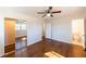 Bright bedroom with hardwood floors and mirrored closet doors at 850 Briarwood Trl, Douglasville, GA 30134