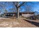 Brick ranch house with carport and mature trees at 850 Briarwood Trl, Douglasville, GA 30134
