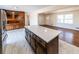 Open kitchen with island and hardwood floors at 850 Briarwood Trl, Douglasville, GA 30134