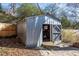 Metal storage shed with ramp access at 850 Briarwood Trl, Douglasville, GA 30134