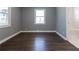 Cozy bedroom with new hardwood floors and two bright windows at 1268 Kenilworth Sw Dr, Atlanta, GA 30310