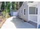 View of the driveway leading to the house and to a detached garage at 1268 Kenilworth Sw Dr, Atlanta, GA 30310