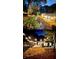 Beautifully landscaped backyard with pathway, string lights, and well-maintained greenery at 2139 Cedarbrook Se Ct, Atlanta, GA 30316