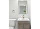 Bathroom features a vanity with gold hardware at 2139 Cedarbrook Se Ct, Atlanta, GA 30316