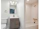 Clean bathroom with a single vanity and a shower/tub combo at 2139 Cedarbrook Se Ct, Atlanta, GA 30316