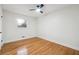 Spacious bedroom with hardwood floors and large window providing natural light at 2139 Cedarbrook Se Ct, Atlanta, GA 30316