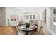 Bright dining room featuring modern decor, a round table set for four, and ample natural light at 2139 Cedarbrook Se Ct, Atlanta, GA 30316