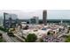 Aerial view of the city, including shopping center and high rises at 750 Park Ne Ave # 6E, Atlanta, GA 30326