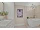 Luxurious bathroom featuring a freestanding tub and walk-in shower at 750 Park Ne Ave # 6E, Atlanta, GA 30326