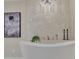 Relaxing bathroom with a soaking tub and modern fixtures at 750 Park Ne Ave # 6E, Atlanta, GA 30326